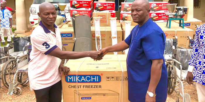 Atwima Mponua  DCE presents items and cash to (54) Persons with Disabilities 2022